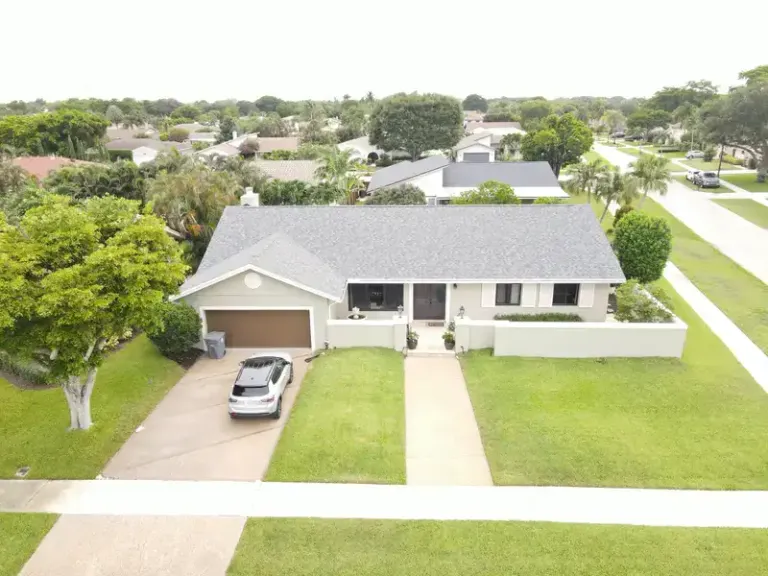 New gray architectural shingle roof on a single-story home