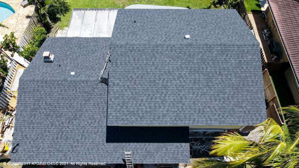 Gray shingle roof aerial view residential