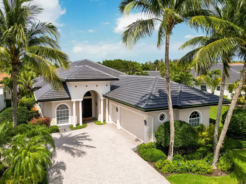Dark tile roof coastal home West Palm Beach