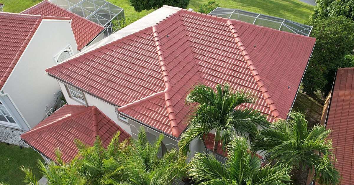 Red tile roof luxury home aerial view