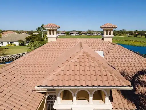 Terracotta tile roof with decorative chimneys