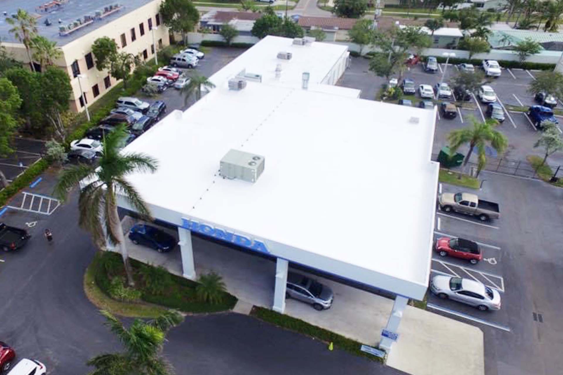 TPO flat roof car dealership aerial view
