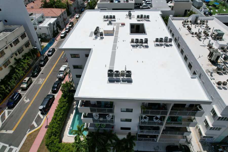 TPO roof replacement condo with pool aerial